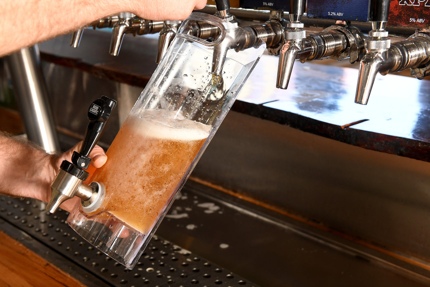 bat tender filling up team keg jug at tap